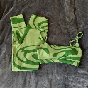 Green Swirl Pattern Leggings and Sports Bra Set by VITALITY X COSMOPOLITAN.